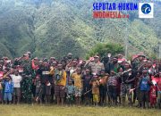 Cinta Tanah Air, Kapolres Puncak Jaya Ikuti Pengibaran Bendera Merah Putih di Bukit Zaitun Bersama Masyarakat Kota Mulia